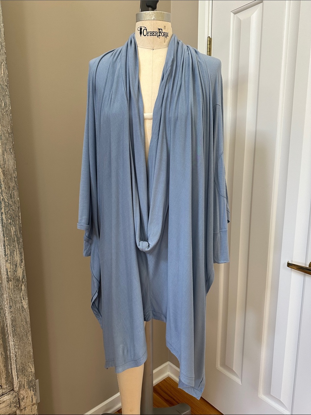 Nicholas K Serius convertible drape top.